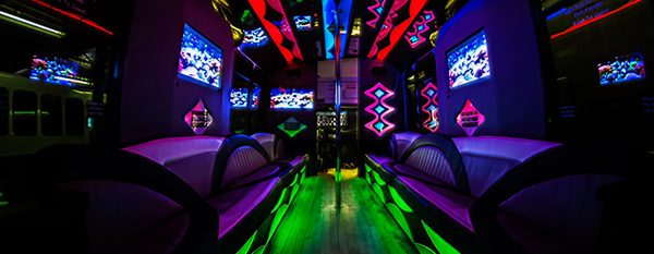 Many modern TVs in a party bus